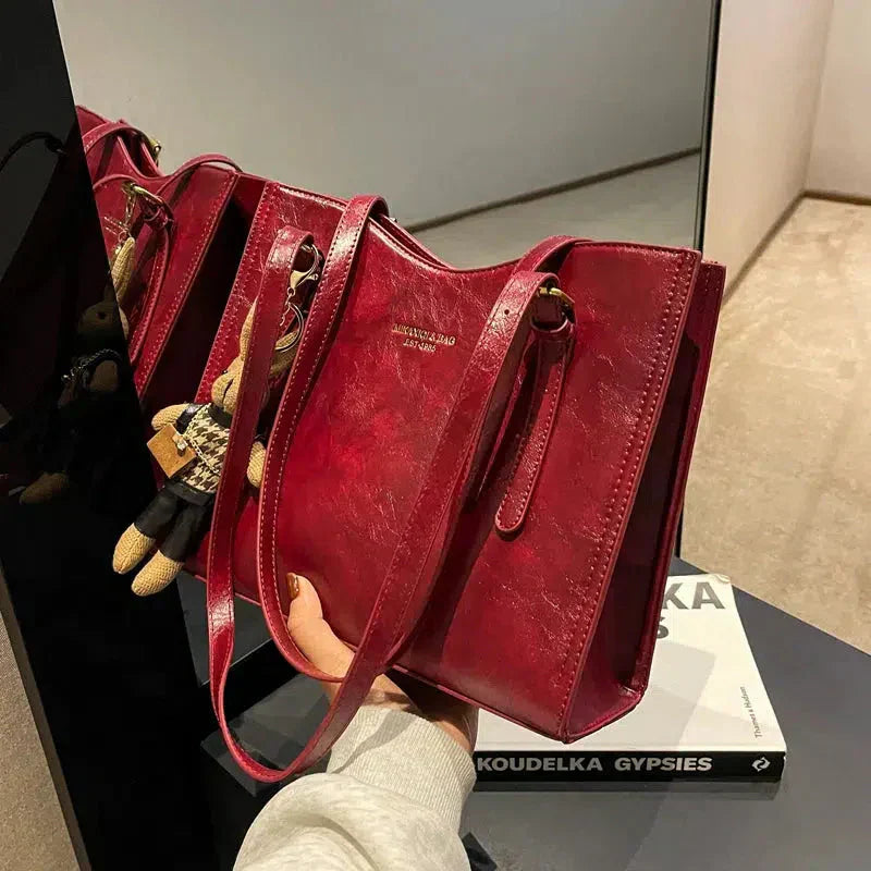 Mirella | Bolso con dijes