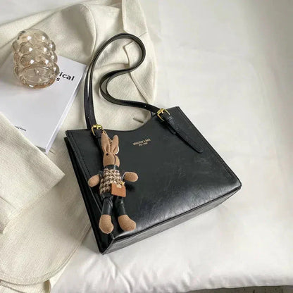 Mirella | Bolso con dijes