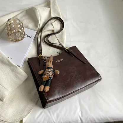 Mirella | Bolso con dijes