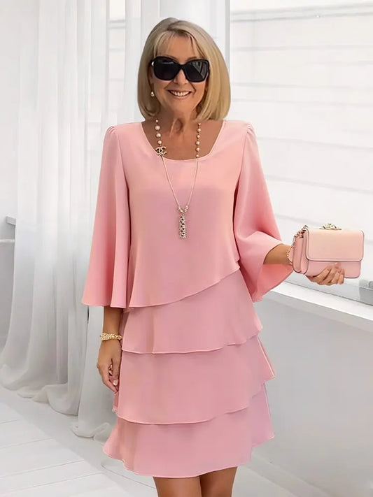 Andrea – Vestido elegante con volantes