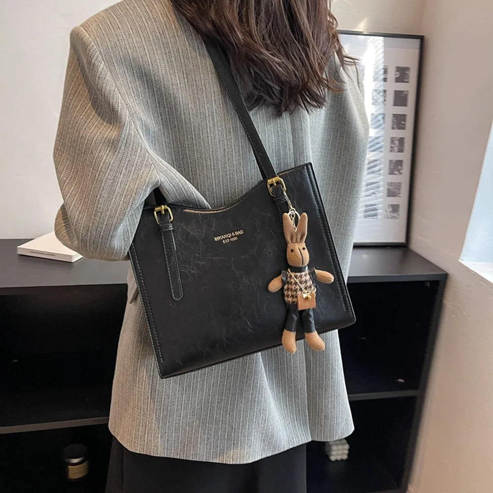 Mirella | Bolso con dijes