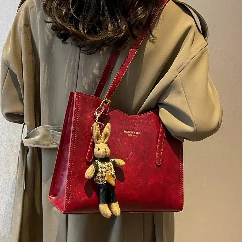 Mirella | Bolso con dijes