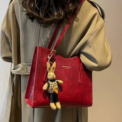 Mirella | Bolso con dijes