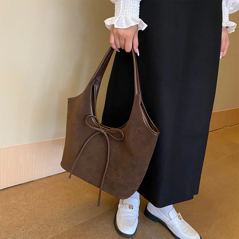 Celina | Bolso tipo cubo con nudo